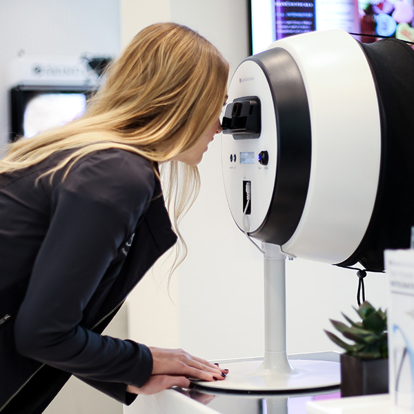 Lady using machine at work